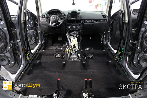 Пылесос ковра Мазды СХ5