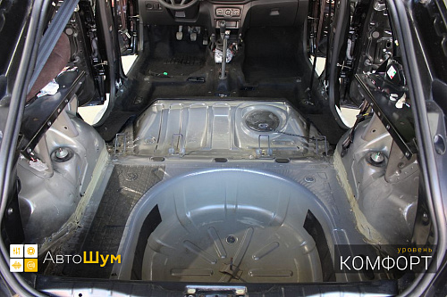 Штатная виброизоляция в багажнике Лада ИКС РЕЙ