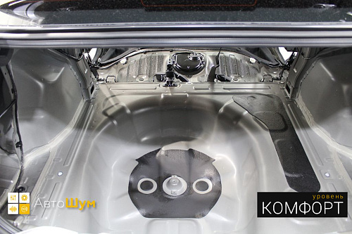 Штатная виброизоляция в багажнике Киа Рио